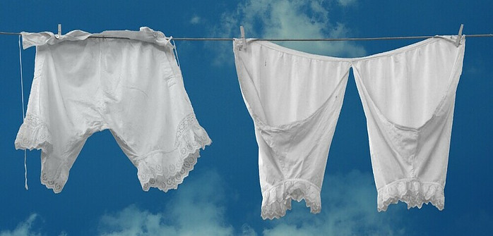 bright-white-bloomers-knickers-crotchless-underwear-hanging-on-a-clothesline-to-dry-in-front-of-a-bright-blue-sky